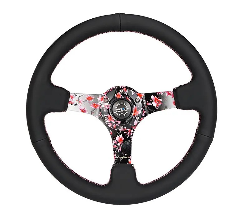 Nrg Reinforced Steering Wheel - Hydro Dipped Sakura Floral 3" Deep, 5Mm Spoke, 350Mm Sport Steering Wheel Pink Suede W/ Black Baseball Stitching - Rst-036Sak-R 1